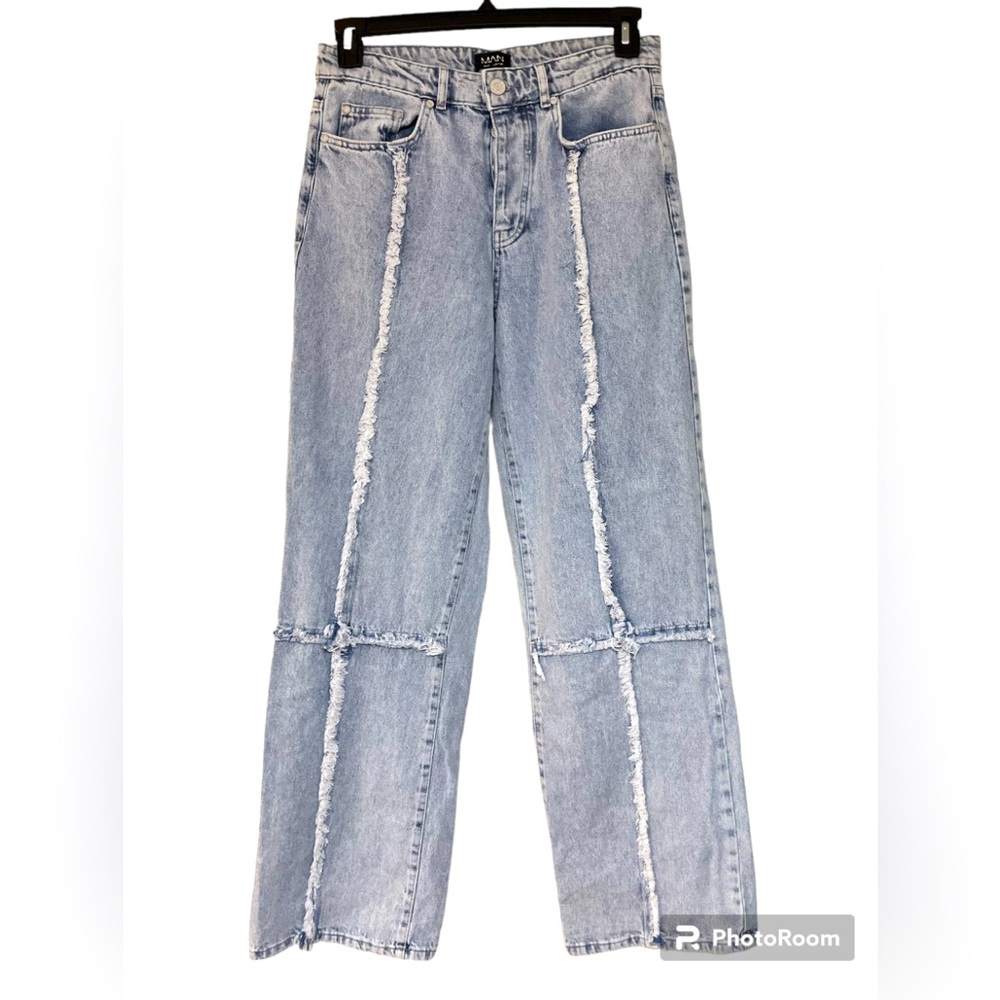 Ice blue distressed denim jeans.